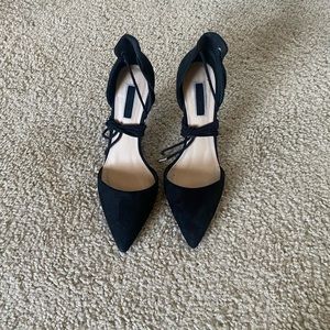 Black lace up heels; pointed toe; worn once